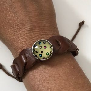 Brown leather weave snap bracelet with snap